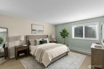 Primary bedroom features walk in closet. *Room is digitally staged to give you design inspiration!