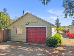 Detached garage with alley access.