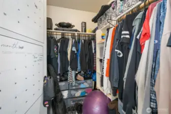 Primary bedroom walk-in closet