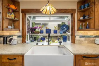 Deluxe sink and garden window. Solid wood cabintets