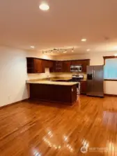 The kitchen is on the main floor and offers high end cabinets, granite counters, stainless steel appliances and it's very spacious!