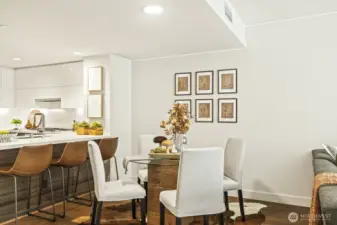 Eat-up bar and dining area seamlessly flow into the living space.