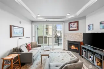 Coffered ceilings make the living room ceilings even higher (cement above and below you minimize noise between floors).