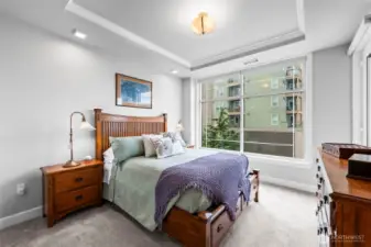 The primary bedroom has a door to the deck, BIG windows (all with up/down shades) and plenty of room for your king-sized bed.