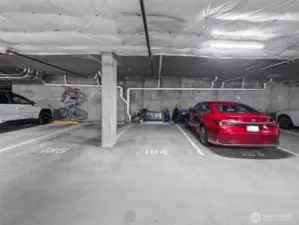 Two parking spaces are included...this one and a coveted EV parking space in a different part of the garage.