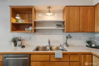 The subway tile backsplash defines the kitchen very well and gives it a "clean" look.