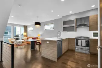 Wine on the deck watching the setting sun light up the houses across the lake in streaks of orange and pink  Watching the snow on the Cascades gather through the winter then melt through the spring.