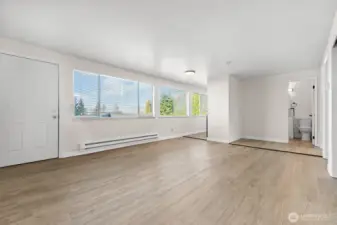 Unit 2 - 2 beds, 1 bath. Newer LVP flooring, paint, light fixtures, and appliances.