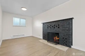 Unit 2 - 2 beds, 1 bath. Newer LVP flooring, paint, light fixtures, and appliances.