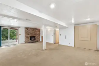 Finished walk-out basement with office nook, recreation room, and a built-in Murphy bed with drop-down  sleeping space.