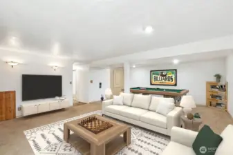 Finished walk-out basement with office nook, recreation room, and a built-in Murphy bed with drop-down  sleeping space.