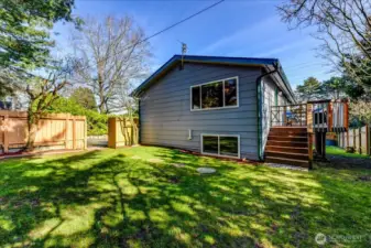 West side yard shaded by mature trees