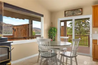 Kitchen with newly added Quartz countertops and tile flooring. Lakeview from kitchen, dining table and Island.