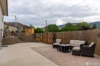 Outdoor patio area, south side of the house, door to the left with access into the basement