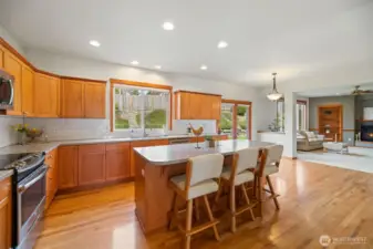 Sit at the kitchen bar and watch the cooking!