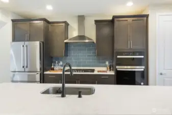 Beautiful backsplash tile and SS appliances