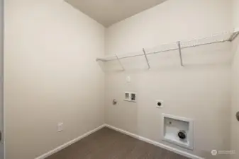 Laundry Room-Disclaimer:  Photos are from another Rose floor plan in previous community, finishes, upgrades, and features will vary.