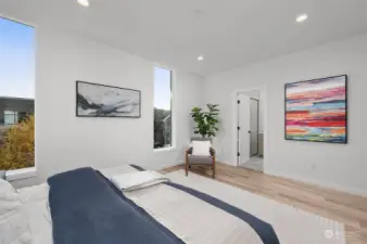 The expansive primary suite has space to create a nook to read in the morning, creating the perfect retreat for relaxation and inspiration.
