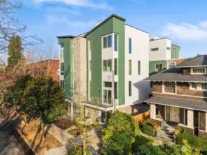 Sleek lines, timeless finishes, and natural greenery come together to create a stunning exterior for this Capitol Hill gem. This is contemporary urban living at its best.