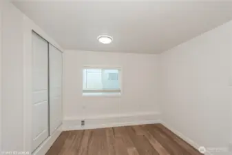 Comfortable second bedroom, perfect for guests, flex-space or a home office.
