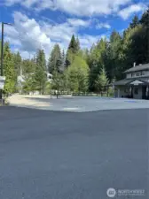 A fabulous club house with basketball court.