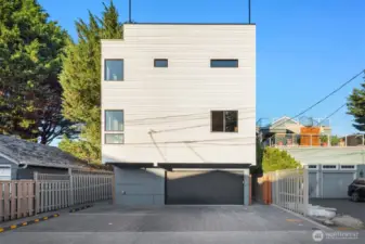 A dedicated off-street parking spot with EV conduit, accessed via the alley, adds convenience, while the fully fenced yard, professionally stained and sealed, provides safety and peace of mind for pets and people alike.