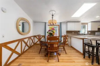Dedicated dining space has custom trim for added charm