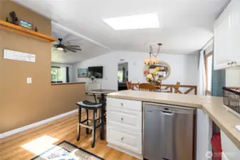 Home is light and bright with large windows and a skylight