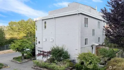 This townhome has what many do not – two living spaces, two outdoor spaces and an extra-large garage with extra off street parking.