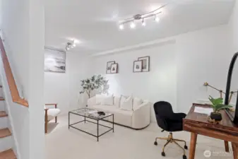 The lower level features a large bonus or media room.  A pleasant surprise to find a second living area in a townhome.
