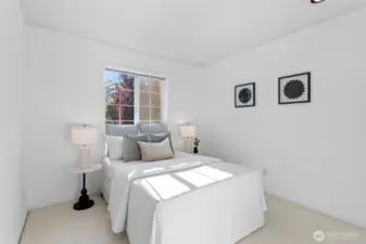The second bedroom overlooks the beautiful front gardens