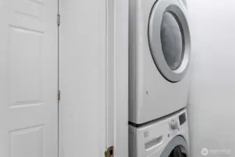 Full-sized newer stacked front-loading washer and dryer