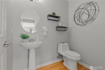 Powder Room with under-stair storage.