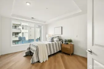 secondary bedroom with large walk in closet