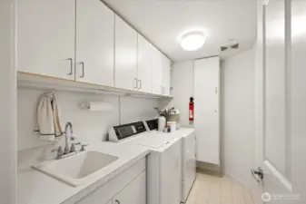 Laundry room with newer washer & dryer