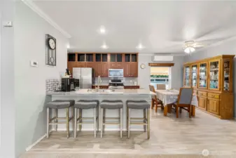 The kitchen and dining area sit right at the heart of the home, perfect for shared meals, conversation, and daily routines.