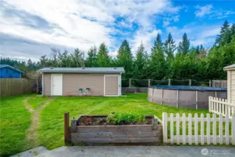 The spacious, fenced yard feels open and private, with room to spread out and enjoy the peaceful surroundings.