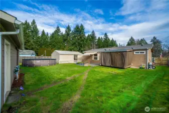 This long view of the yard shows plenty of open space, making it perfect for play and outdoor fun.