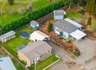 From above, the home sits comfortably at the end of a quiet cul-de-sac, surrounded by greenery and a classic Pacific Northwest backdrop. Don't delay--see this home today!