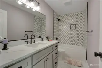 Designer Tile in Hall Bath with Both Tub & Shower.  Stunning!