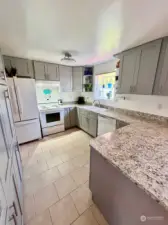 Updated kitchen has plenty of soft closed cabinets!