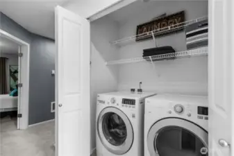 Full size washer and dryer conveniently located on the upper level near the bedrooms.