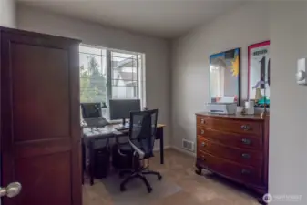 Bright and versatile spare bedroom offers endless possibilities—perfect as a home office, guest suite, or hobby room. Large window fills the space with natural light