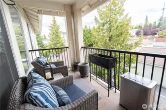Private balcony sitting area perfect for morning coffee or evening relaxation. Enjoy outdoor living with room for seating, fresh air, and views that extend your living space.