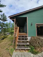 There is a large deck on the front of the home which is large enough for bistro tables and chairs to enjoy the views.  Loads of potential here!