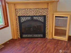 A remote controlled propane fired gas log fireplace provides warmth in the winter and adds a touch of ambiance to the Livingroom area.