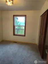 Bedroom 2 takes in views of Hood Canal and the Olympic Mountain Range, Full size closet and new carpet