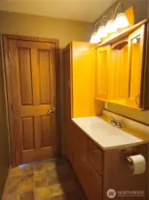 There is a large vanity in the main bath together with a linen closet!