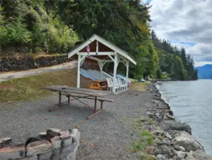 The private community beach has picnic tables, fire pit, weather shelter and areas to store small craft.  there is a boat launch as well for owners!