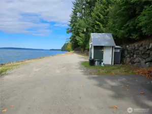 Looking across the roadway at the private community beach area and the Ricketts Beach club house